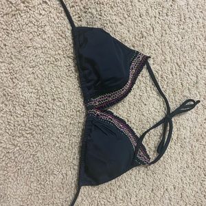 Black string bikini top. With colored trim.